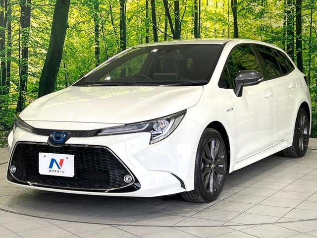 カローラツーリング ハイブリッド ダブルバイビー 禁煙車 純正9型ナビ ブラインドスポットモニター シートヒーター セーフティセンス バックカメラ ドラレコ Bluetooth ETC レーダークルコン ハーフレザーシート 17インチアルミ(21枚目)