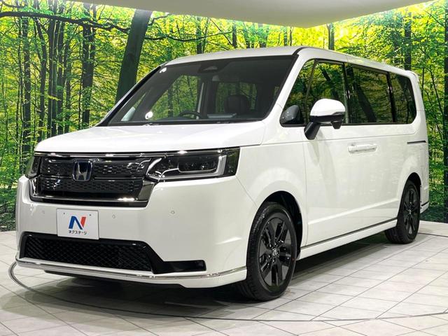 ステップワゴン e:HEVスパーダ 登録済未使用車 純正11.4型ナビ バックカメラ 両側電動ドア ブラインドスポットモニター 電動リアゲート レーダークルーズ ホンダセンシング スマートキー LEDヘッドライト オートハイビーム(24枚目)