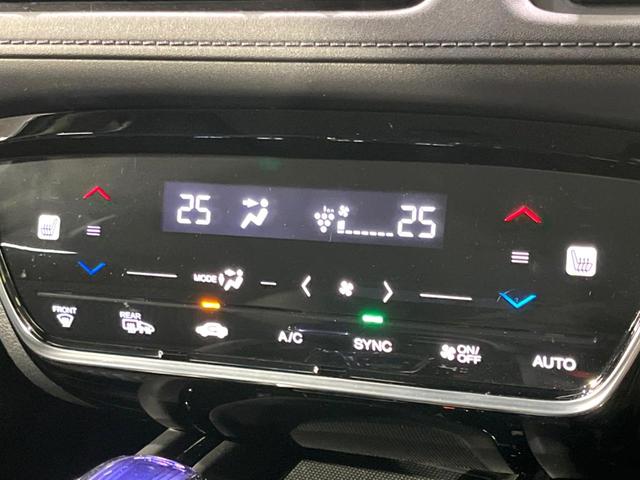 ヴェゼル ハイブリッドＺ・ホンダセンシング　禁煙車　８型メモリーナビ　バックカメラ　ＥＴＣ　シートヒーター　アダプティブクルーズ　スマートキー　ＬＥＤヘッドライト　オートライト　ＬＥＤフロントフォグランプ　デュアルエアコン（34枚目）