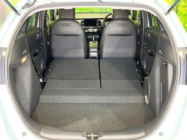 フィット ｅ：ＨＥＶホーム　後期　禁煙車　純正９型ナビ　ホンダセンシング　バックカメラ　ＥＴＣ　アダプティブクルコン　ハーフレザーシート　コーナーセンサー　ＬＥＤヘッド　オートライト　オートエアコン　スマートキー（10枚目）