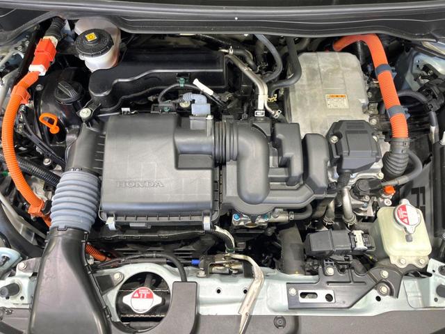 フィット ｅ：ＨＥＶホーム　後期　禁煙車　純正９型ナビ　ホンダセンシング　バックカメラ　ＥＴＣ　アダプティブクルコン　ハーフレザーシート　コーナーセンサー　ＬＥＤヘッド　オートライト　オートエアコン　スマートキー（18枚目）