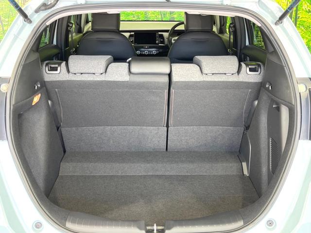フィット ｅ：ＨＥＶホーム　後期　禁煙車　純正９型ナビ　ホンダセンシング　バックカメラ　ＥＴＣ　アダプティブクルコン　ハーフレザーシート　コーナーセンサー　ＬＥＤヘッド　オートライト　オートエアコン　スマートキー（34枚目）