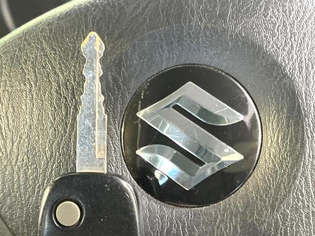 ジムニー クロスアドベンチャー 後期 禁煙車 メモリーナビ ETC 前席シートヒーター キーレス 純正16インチアルミホイール Bluetooth CD DVD再生 フルセグ(5枚目)