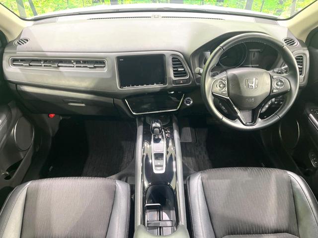 ヴェゼル ハイブリッドＺ・ホンダセンシング　後期　禁煙車　純正８型ナビ　ドラレコ　ＥＴＣ　バックカメラ　シートヒーター　パワーシート　アダプティブクルーズ　ルーフレール　ハーフレザーシート　ＬＥＤヘッドライト　トノボード　Ｂｌｕｅｔｏｏｔｈ（2枚目）