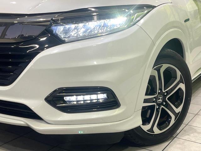 ヴェゼル ハイブリッドＺ・ホンダセンシング　後期　禁煙車　純正８型ナビ　ドラレコ　ＥＴＣ　バックカメラ　シートヒーター　パワーシート　アダプティブクルーズ　ルーフレール　ハーフレザーシート　ＬＥＤヘッドライト　トノボード　Ｂｌｕｅｔｏｏｔｈ（12枚目）