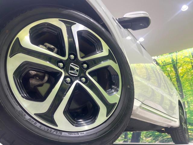 ヴェゼル ハイブリッドＺ・ホンダセンシング　後期　禁煙車　純正８型ナビ　ドラレコ　ＥＴＣ　バックカメラ　シートヒーター　パワーシート　アダプティブクルーズ　ルーフレール　ハーフレザーシート　ＬＥＤヘッドライト　トノボード　Ｂｌｕｅｔｏｏｔｈ（13枚目）