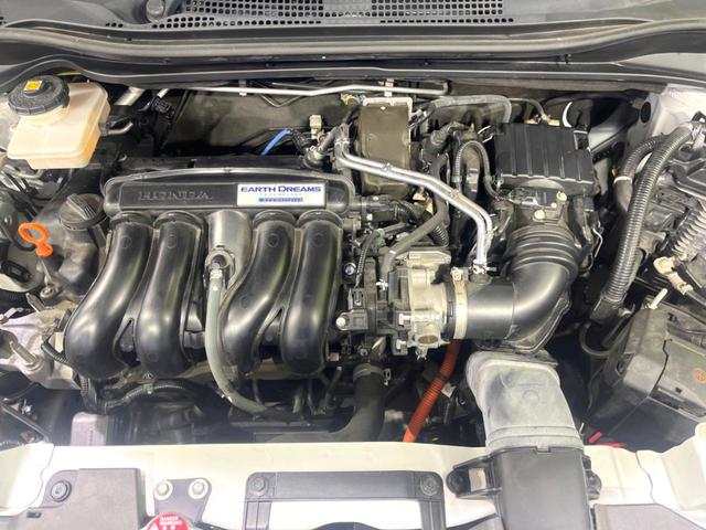 ヴェゼル ハイブリッドＺ・ホンダセンシング　後期　禁煙車　純正８型ナビ　ドラレコ　ＥＴＣ　バックカメラ　シートヒーター　パワーシート　アダプティブクルーズ　ルーフレール　ハーフレザーシート　ＬＥＤヘッドライト　トノボード　Ｂｌｕｅｔｏｏｔｈ（18枚目）