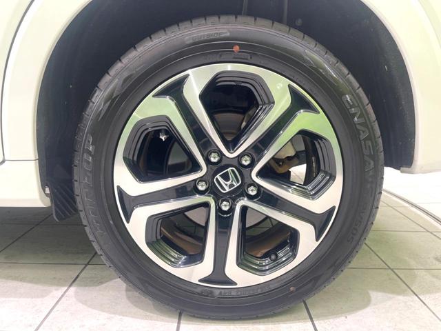 ヴェゼル ハイブリッドＺ・ホンダセンシング　後期　禁煙車　純正８型ナビ　ドラレコ　ＥＴＣ　バックカメラ　シートヒーター　パワーシート　アダプティブクルーズ　ルーフレール　ハーフレザーシート　ＬＥＤヘッドライト　トノボード　Ｂｌｕｅｔｏｏｔｈ（64枚目）