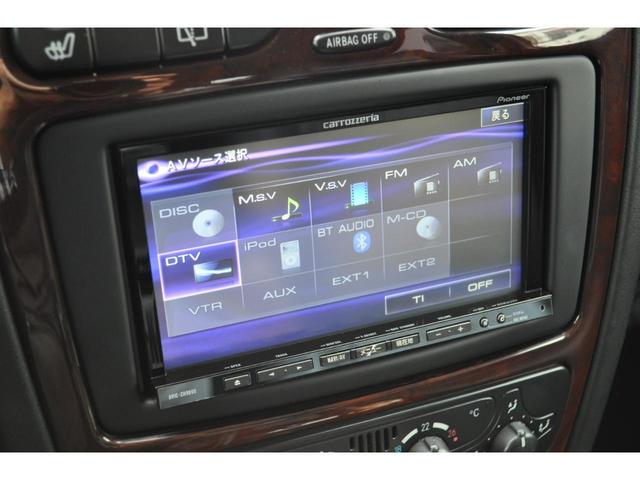 Ｇクラス Ｇ５００Ｌ　禁煙車／黒革／サンルーフ／左ハンドル／メモリーナビ／フルセグＴＶ／Ｂｌｕｅｔｏｏｔｈ／ＣＤ／ＤＶＤ／Ｂカメラ／ＥＴＣ／シートヒーター／前席メモリーシート／左右出しマフラー／黒純正ホイール／ＨＩＤライト（12枚目）