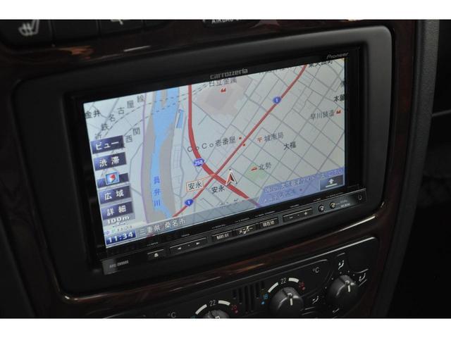 Ｇクラス Ｇ５００Ｌ　禁煙車／黒革／サンルーフ／左ハンドル／メモリーナビ／フルセグＴＶ／Ｂｌｕｅｔｏｏｔｈ／ＣＤ／ＤＶＤ／Ｂカメラ／ＥＴＣ／シートヒーター／前席メモリーシート／左右出しマフラー／黒純正ホイール／ＨＩＤライト（13枚目）