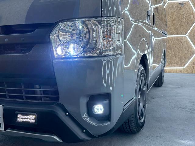 レジアスエースバン ミディアムグレー×ラプターブラック 新品LED内臓バンパーガード 荷室内装WOOD仕様 新品ガングリップステアリング 新品木目インテリアパネル フルセグTV ナビ バックカメラ 電動格納ミラー(15枚目)