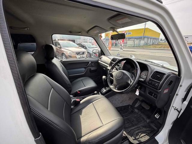 ジムニー ＦＩＳフリースタイルワールドカップリミテッド　４ＷＤ　キーレスエントリー　電動格納ミラー　シートヒーター　ＡＴ　ＡＢＳ　ＣＤ　ＵＳＢ　ルーフレール　アルミホイール　衝突安全ボディ　エアコン　パワーウィンドウ（9枚目）