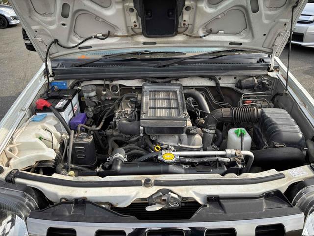 ジムニー ＦＩＳフリースタイルワールドカップリミテッド　４ＷＤ　キーレスエントリー　電動格納ミラー　シートヒーター　ＡＴ　ＡＢＳ　ＣＤ　ＵＳＢ　ルーフレール　アルミホイール　衝突安全ボディ　エアコン　パワーウィンドウ（19枚目）