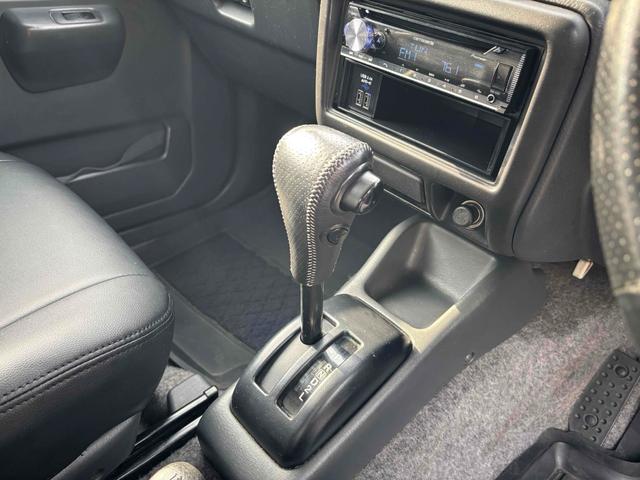 ジムニー ＦＩＳフリースタイルワールドカップリミテッド　４ＷＤ　キーレスエントリー　電動格納ミラー　シートヒーター　ＡＴ　ＡＢＳ　ＣＤ　ＵＳＢ　ルーフレール　アルミホイール　衝突安全ボディ　エアコン　パワーウィンドウ（22枚目）