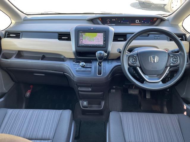 フリード G・ホンダセンシング 両側電動スライドドア・純正ナビ・Bluetoothオーディオ・バックカメラ・ETC・アダプティブクルーズコントロール・LEDヘッドライト・Cパッケージ・コンフォートビューパッケージ・軽減ブレーキ・禁煙(2枚目)