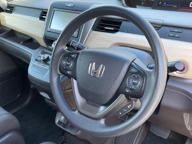 フリード G・ホンダセンシング 両側電動スライドドア・純正ナビ・Bluetoothオーディオ・バックカメラ・ETC・アダプティブクルーズコントロール・LEDヘッドライト・Cパッケージ・コンフォートビューパッケージ・軽減ブレーキ・禁煙(35枚目)