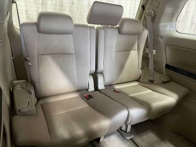 ヴェルファイアハイブリッド V 6ヶ月走行無制限保証付き Wサンルーフ 純正8型ナビ 両側パワースライドドア 電動リアゲート 寒冷地仕様 禁煙車 バックカメラ オットマン Wエアコン ETC 純正16インチアルミホイール クルコン(10枚目)