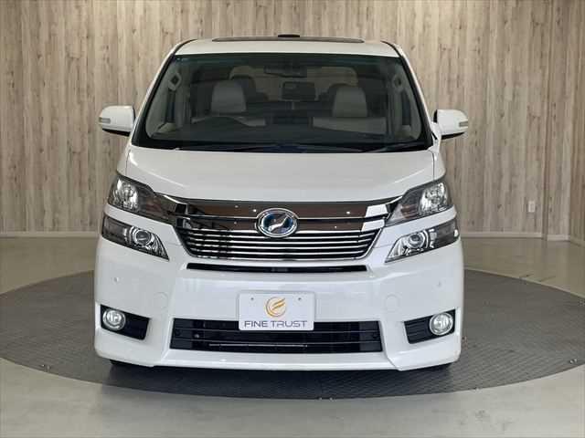 ヴェルファイアハイブリッド V 6ヶ月走行無制限保証付き Wサンルーフ 純正8型ナビ 両側パワースライドドア 電動リアゲート 寒冷地仕様 禁煙車 バックカメラ オットマン Wエアコン ETC 純正16インチアルミホイール クルコン(15枚目)