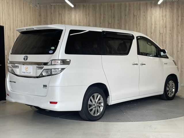 ヴェルファイアハイブリッド V 6ヶ月走行無制限保証付き Wサンルーフ 純正8型ナビ 両側パワースライドドア 電動リアゲート 寒冷地仕様 禁煙車 バックカメラ オットマン Wエアコン ETC 純正16インチアルミホイール クルコン(18枚目)