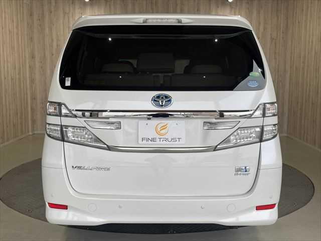 ヴェルファイアハイブリッド V 6ヶ月走行無制限保証付き Wサンルーフ 純正8型ナビ 両側パワースライドドア 電動リアゲート 寒冷地仕様 禁煙車 バックカメラ オットマン Wエアコン ETC 純正16インチアルミホイール クルコン(19枚目)