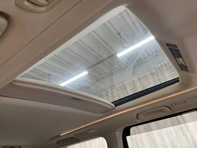 ヴェルファイアハイブリッド V 6ヶ月走行無制限保証付き Wサンルーフ 純正8型ナビ 両側パワースライドドア 電動リアゲート 寒冷地仕様 禁煙車 バックカメラ オットマン Wエアコン ETC 純正16インチアルミホイール クルコン(50枚目)