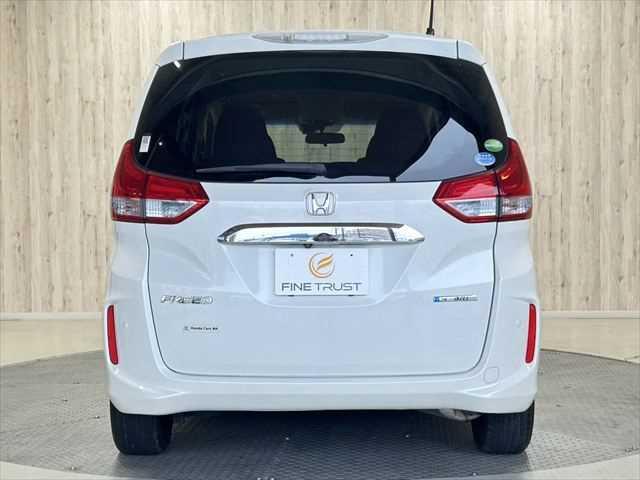 フリードハイブリッド ハイブリッド・Ｇホンダセンシング　６ヶ月走行無制限保証付き　両側電動スライド　ＬＥＤヘッド　ワンオーナー　ＳＤナビ　レーダークルーズ　禁煙車　１５インチアルミ　ＥＴＣ　パワーウィンドウ　スマートキー　バックカメラ　衝突軽減ブレーキ（20枚目）