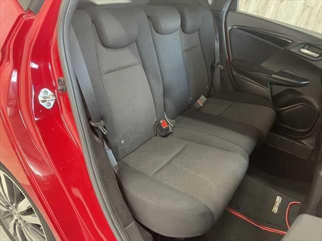 フィットハイブリッド Sパッケージ 6ヶ月走行距離無制限保証付 ユーザー買取車 純正メモリーナビ 衝突軽減ブレーキ LEDヘッドライト クルーズコントロール 禁煙車 バックカメラ 純正15インチAW ETC MTモード付 スマートキー(9枚目)