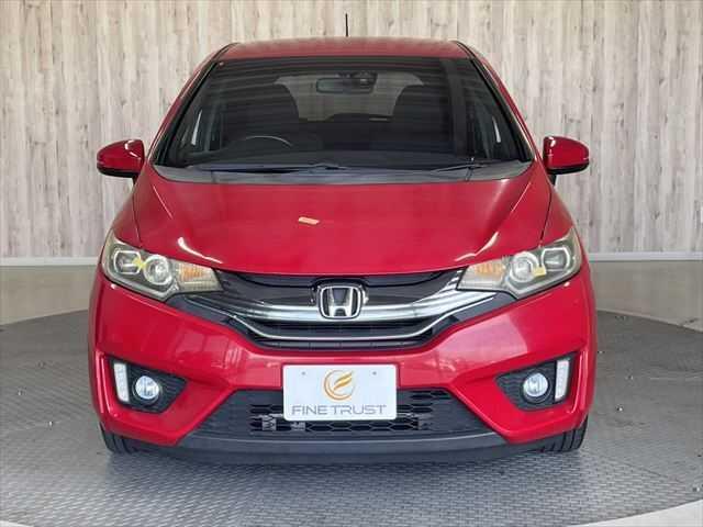 フィットハイブリッド Sパッケージ 6ヶ月走行距離無制限保証付 ユーザー買取車 純正メモリーナビ 衝突軽減ブレーキ LEDヘッドライト クルーズコントロール 禁煙車 バックカメラ 純正15インチAW ETC MTモード付 スマートキー(14枚目)