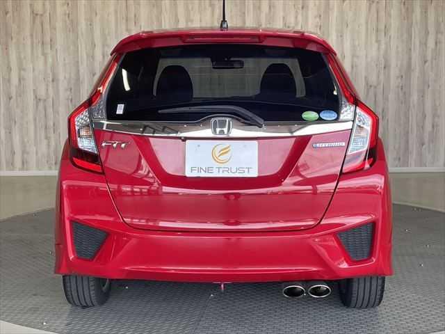 フィットハイブリッド Sパッケージ 6ヶ月走行距離無制限保証付 ユーザー買取車 純正メモリーナビ 衝突軽減ブレーキ LEDヘッドライト クルーズコントロール 禁煙車 バックカメラ 純正15インチAW ETC MTモード付 スマートキー(18枚目)