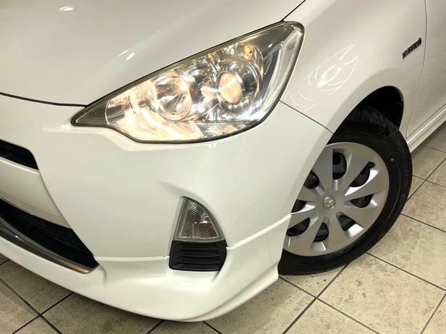 アクア Ｇ　モデリスタエアロ　純正ナビ　ｂｌｕｅｔｏｏｔｈ　フルセグ　ＥＴＣ　禁煙車　オートライト　オートエアコン　スマートキー　電動格納ミラー　シートリフター　ウインカー三ラー　バニティミラー（12枚目）