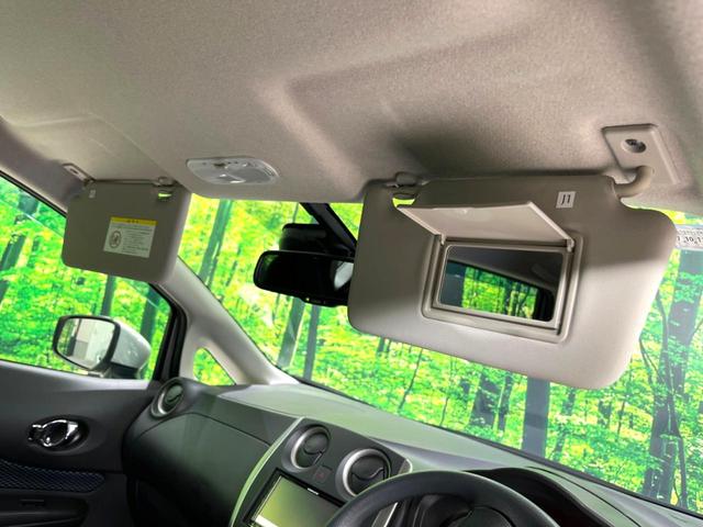 ノート X 禁煙車 全周囲カメラ ナビゲーション 衝突軽減装置 車線逸脱警報 クリアランスソナー オートライト スマートキー アイドリングストップ シートリフター バニティミラー スペアタイヤ(27枚目)