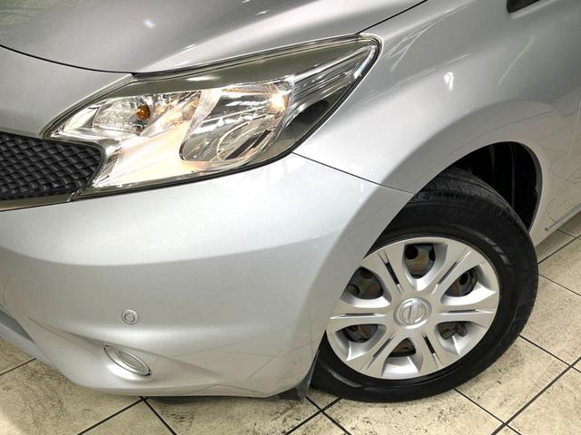 ノート X 禁煙車 全周囲カメラ ナビゲーション 衝突軽減装置 車線逸脱警報 クリアランスソナー オートライト スマートキー アイドリングストップ シートリフター バニティミラー スペアタイヤ(33枚目)
