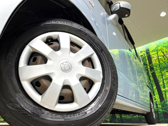 N-BOX G・Lパッケージ 電動スライドドア SDナビ オートエアコン ドライブレコーダー スマートキー 電動格納ミラー バニティミラー ヘッドライドレベライザー ステアリングスイッチ 横滑り防止装置 ドアバイザー(13枚目)