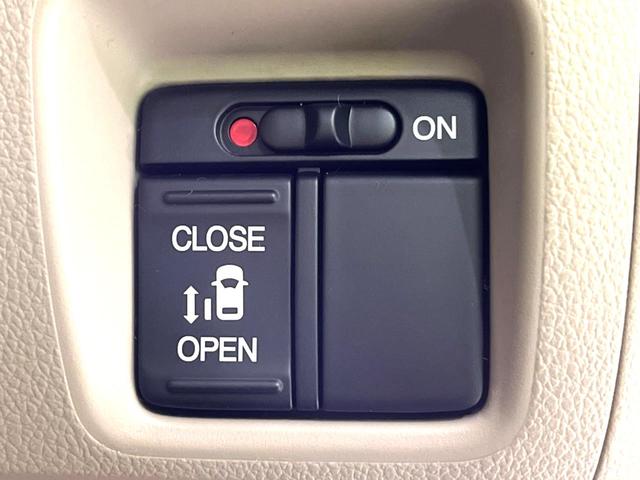 N-BOX G・Lパッケージ 電動スライドドア 純正ナビ バックカメラ 禁煙車 ドラレコ ETC オートエアコン スマートキー 電動格納ミラー バニティミラー ステアリングスイッチ ヘッドライドレベライザー シガーソケット(3枚目)