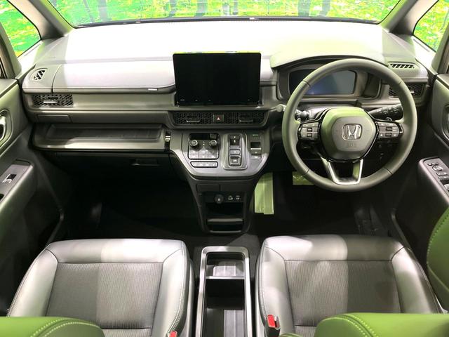 ステップワゴン e:HEVスパーダ 登録済未使用車 両側電動スライドドア 純正11.4型ナビ バックカメラ 衝突軽減 レーダークルーズ パドルシフト 電動リアゲート ハーフレザーシート コーナーセンサー LEDヘッド オートハイビーム(2枚目)