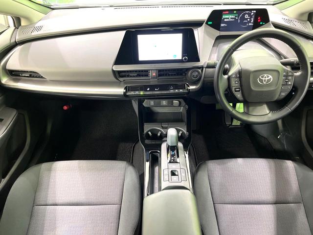 プリウス Ｘ　現行モデル　禁煙車　純正ディスプレイオーディオ　ブラインドスポットモニター　衝突軽減装置　ＡＣ１００Ｖ電源　ビルトインＥＴＣ　ドラレコ　純正革巻きステアリング　ステアリングスイッチ（2枚目）