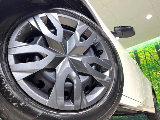 プリウス Ｘ　現行モデル　禁煙車　純正ディスプレイオーディオ　ブラインドスポットモニター　衝突軽減装置　ＡＣ１００Ｖ電源　ビルトインＥＴＣ　ドラレコ　純正革巻きステアリング　ステアリングスイッチ（14枚目）