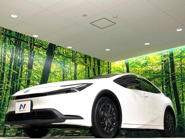 プリウス Ｘ　現行モデル　禁煙車　純正ディスプレイオーディオ　ブラインドスポットモニター　衝突軽減装置　ＡＣ１００Ｖ電源　ビルトインＥＴＣ　ドラレコ　純正革巻きステアリング　ステアリングスイッチ（30枚目）