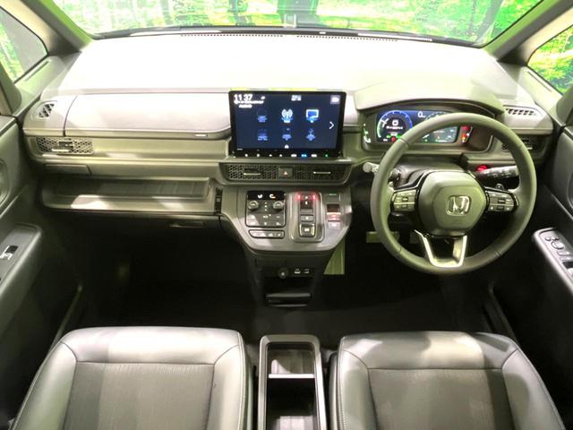 ステップワゴン e:HEVスパーダ 登録済未使用車 11.4型純正ナビ 両側電動スライドドア バックカメラ オットマン 衝突軽減 禁煙車 ハーフレザーシート コーナーセンサー スマートキー LEDヘッド 純正16インチアルミ(2枚目)