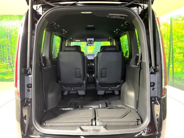 ステップワゴン e:HEVスパーダ 登録済未使用車 11.4型純正ナビ 両側電動スライドドア バックカメラ オットマン 衝突軽減 禁煙車 ハーフレザーシート コーナーセンサー スマートキー LEDヘッド 純正16インチアルミ(11枚目)