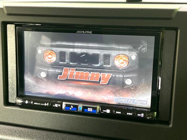 ジムニー ＸＣ　禁煙車　アルパイン製ナビ　衝突軽減装置　ドライブレコーダー　シートヒーター　ＵＳＢポート　クルーズコントロール　背面タイヤカバー　フォグランプ　ダウンヒルアシスト　ドラミラーヒーター　オートライト（3枚目）