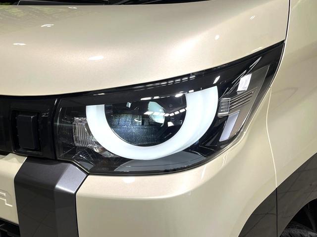 デリカミニ Ｔ　プレミアム　届出済未使用車　両側電動ドア　全周囲カメラ　衝突軽減　ハーフレザーシート　コーナーセンサー　スマートキー　ＬＥＤヘッド　純正１５インチアルミ　車線逸脱警報　オートライト　オートエアコン（63枚目）