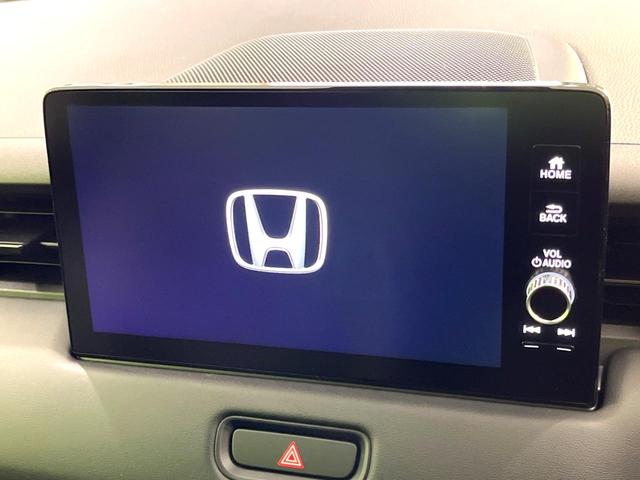 ヴェゼル ｅ：ＨＥＶ　Ｚ　登録済未使用車　純正９インチナビ　全周囲カメラ　衝突軽減　レーダークルーズ　ＥＴＣ　ＬＥＤヘッド　オートライト　オートエアコン　電動リアゲート　前席シートヒーター　コーナーセンサー　電動パーキング（3枚目）