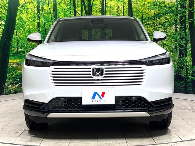 ヴェゼル ｅ：ＨＥＶ　Ｚ　登録済未使用車　純正９インチナビ　全周囲カメラ　衝突軽減　レーダークルーズ　ＥＴＣ　ＬＥＤヘッド　オートライト　オートエアコン　電動リアゲート　前席シートヒーター　コーナーセンサー　電動パーキング（14枚目）