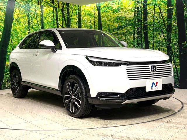 ヴェゼル ｅ：ＨＥＶ　Ｚ　登録済未使用車　純正９インチナビ　全周囲カメラ　衝突軽減　レーダークルーズ　ＥＴＣ　ＬＥＤヘッド　オートライト　オートエアコン　電動リアゲート　前席シートヒーター　コーナーセンサー　電動パーキング（16枚目）