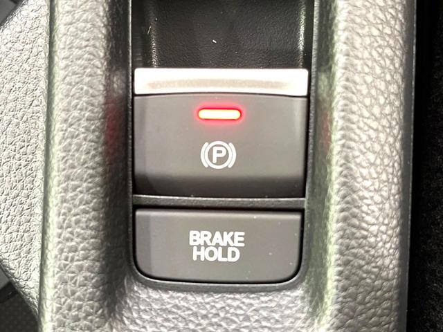 ヴェゼル ｅ：ＨＥＶ　Ｚ　登録済未使用車　純正９インチナビ　全周囲カメラ　衝突軽減　レーダークルーズ　ＥＴＣ　ＬＥＤヘッド　オートライト　オートエアコン　電動リアゲート　前席シートヒーター　コーナーセンサー　電動パーキング（35枚目）