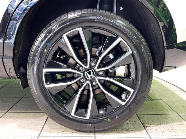 ヴェゼル ｅ：ＨＥＶ　Ｚ　登録済未使用車　純正９インチナビ　全周囲カメラ　衝突軽減　レーダークルーズ　ＥＴＣ　ＬＥＤヘッド　オートライト　オートエアコン　電動リアゲート　前席シートヒーター　コーナーセンサー　電動パーキング（67枚目）