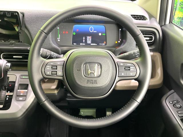 フリード e:HEVエアー EX 登録済未使用車 両側電動ドア 衝突被害軽減システム コーナーセンサー スマートキー LEDヘッド 純正15インチアルミ オートハイビーム 車線逸脱警報 オートライト オートエアコン(12枚目)