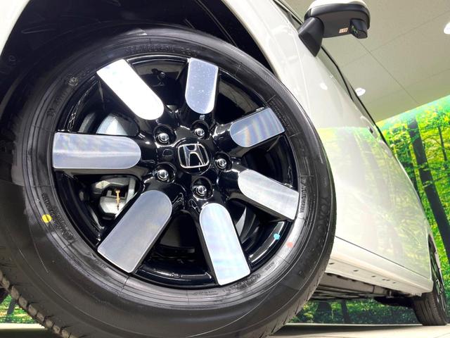 フリード e:HEVエアー EX 登録済未使用車 両側電動ドア 衝突被害軽減システム コーナーセンサー スマートキー LEDヘッド 純正15インチアルミ オートハイビーム 車線逸脱警報 オートライト オートエアコン(14枚目)