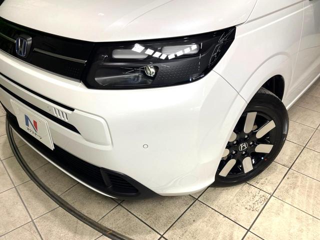 フリード e:HEVエアー EX 登録済未使用車 両側電動ドア 衝突被害軽減システム コーナーセンサー スマートキー LEDヘッド 純正15インチアルミ オートハイビーム 車線逸脱警報 オートライト オートエアコン(25枚目)